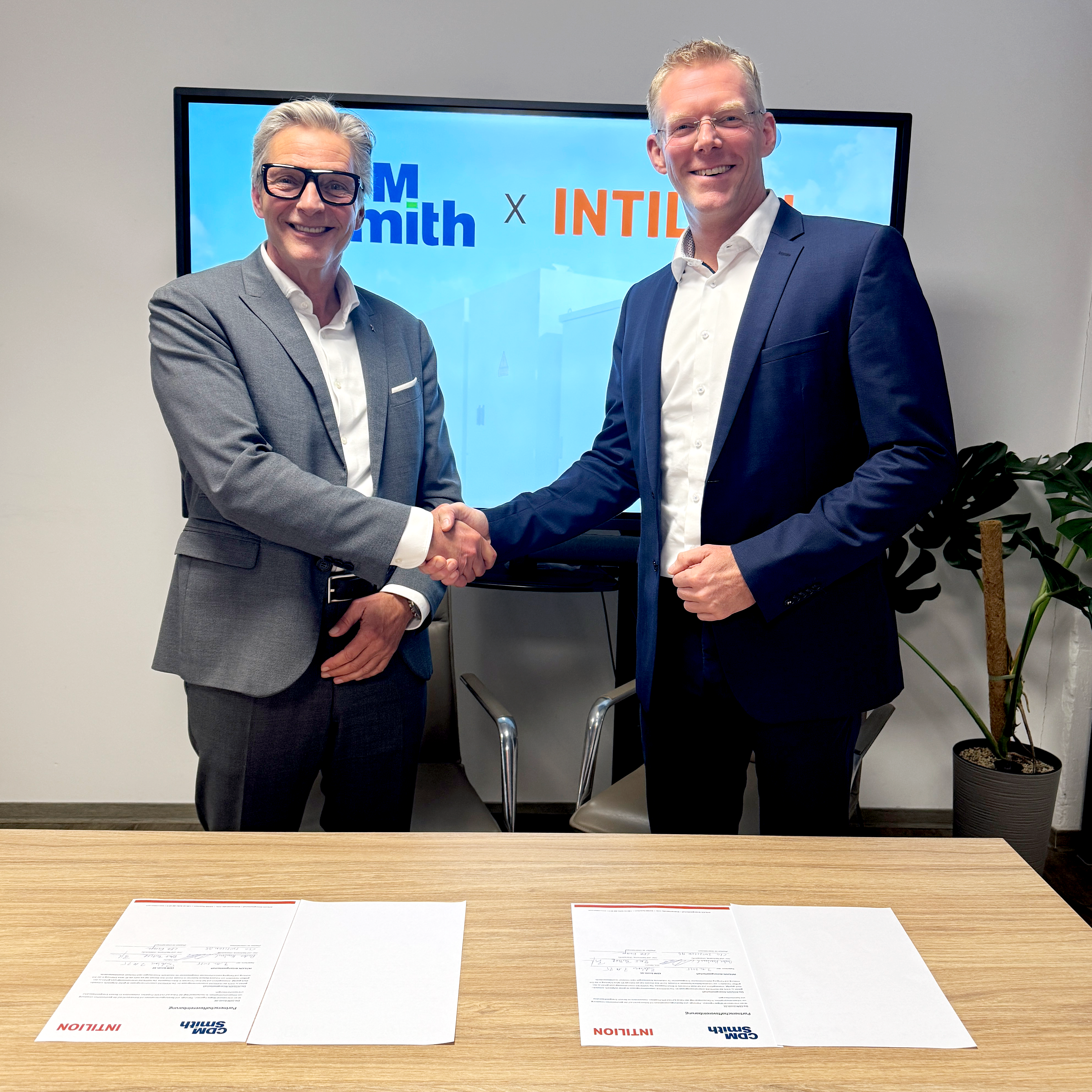 two mens are shaking Hands 